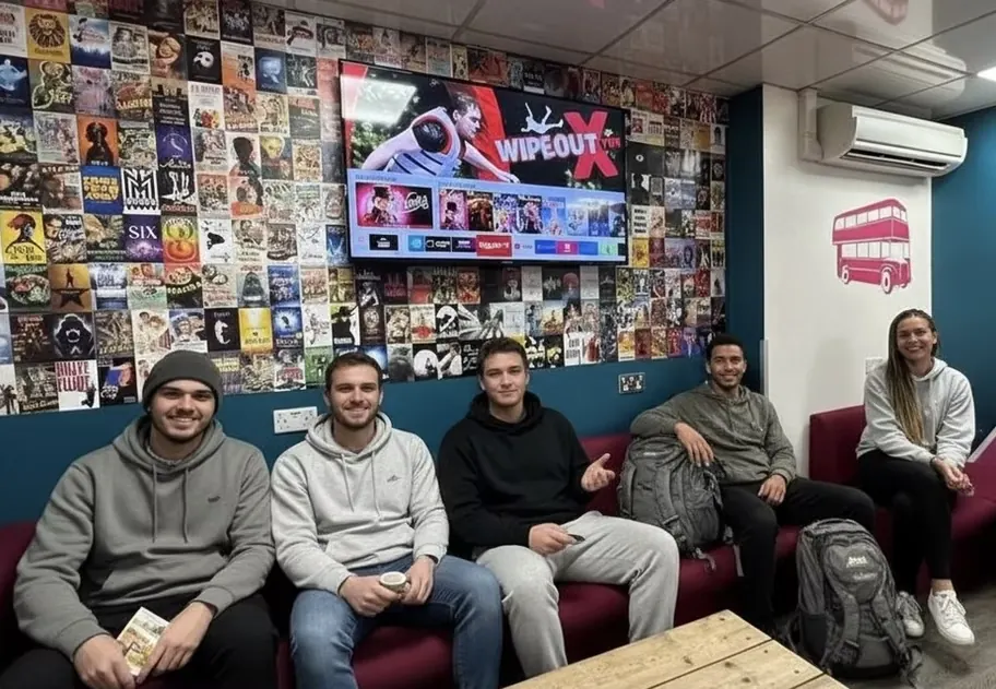 TV lounge with movie poster wall