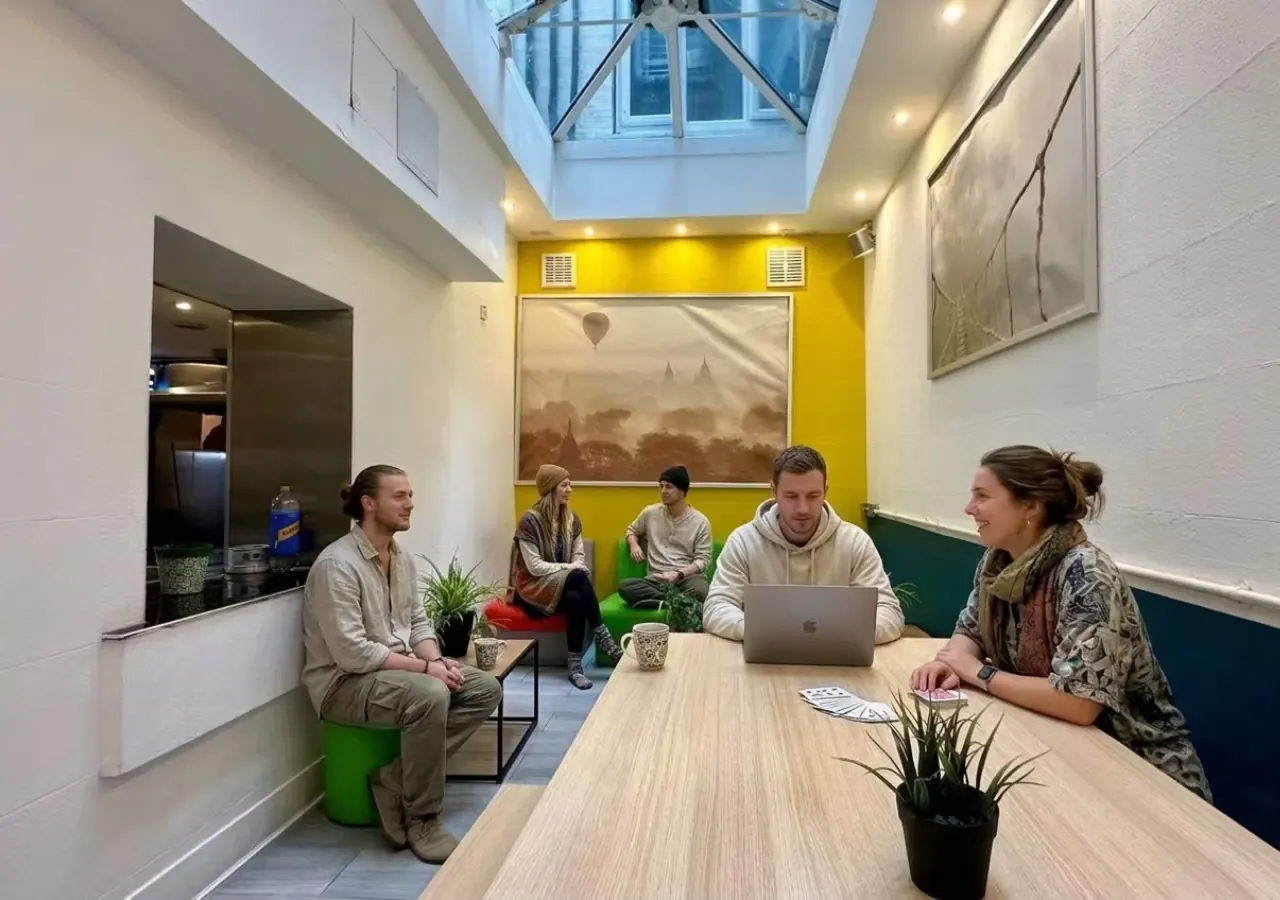 Skylit lounge with guests hanging out